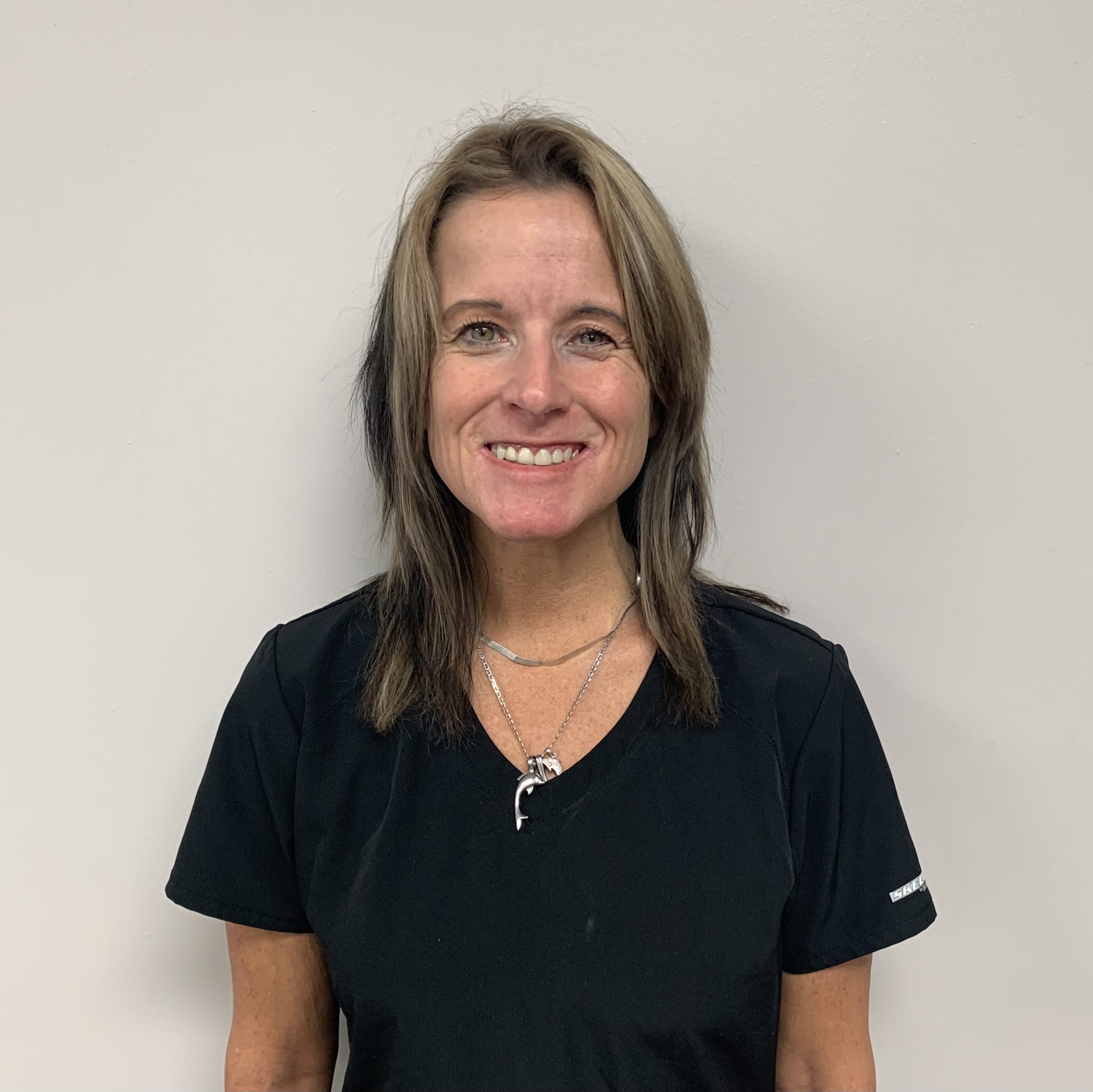 A portrait of nurse patient care coordinator Jenny